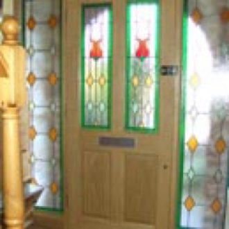 wooden door with glazing
