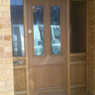 wooden external door with glazing